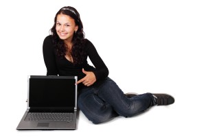 woman_pointing_at_computer_186925